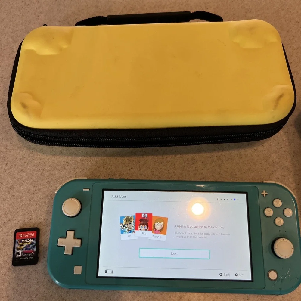 Nintendo Switch Lite Handheld Teal with Pikachu Case One Game And Console Case